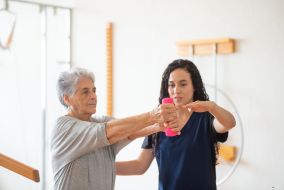 physical therapist with her patient